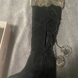 Black suede boots, just under the knee